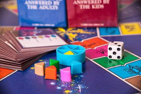 WOODBRIDGE, NEW JERSEY / USA - January 29, 2020: A 1980s Disney version of the classic board game, Trivial Pursuit, is pictured in this illustrative editorial image.のeditorial素材