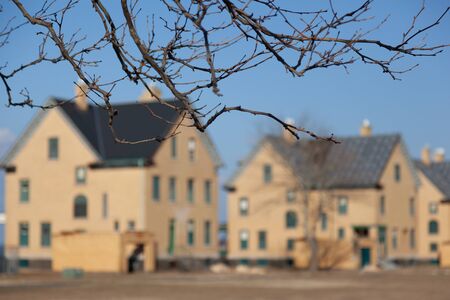 A view of the empty military residences along Officer's Row at Fort Hancock. The focus in this image...