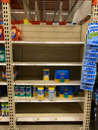 WOODBRIDGE, NEW JERSEY / USA - March 4, 2020: A display of Clorox and other sanitizing wipes is nearly empty due to Coronavirus panic buying at this local supermarket. Illustrative editorial use only.のeditorial素材