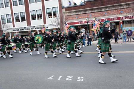 ASBURY PARK, NEW JERSEY - March 13, 2016: Mummers march down Cookman Avenue to celebrate St....