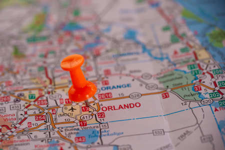 WOODBRIDGE, NEW JERSEY - July 13, 2020: A map of Florida is shown with a focus on the Orlando area and an orange push pinのeditorial素材