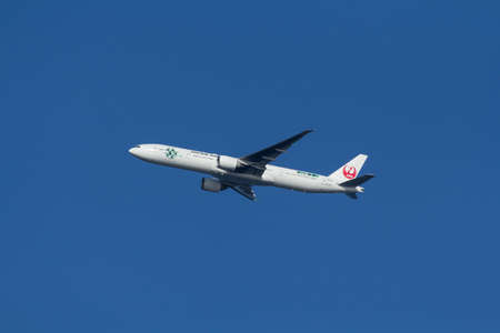 HIGHLANDS, NEW JERSEY - July 26, 2017: a Japan Air jet flies over Sandy Hookのeditorial素材