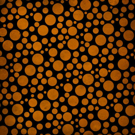 Digital paper is designed in a vintage grunge style with black and orange colors. This one is done in a polkadot pattern.の写真素材