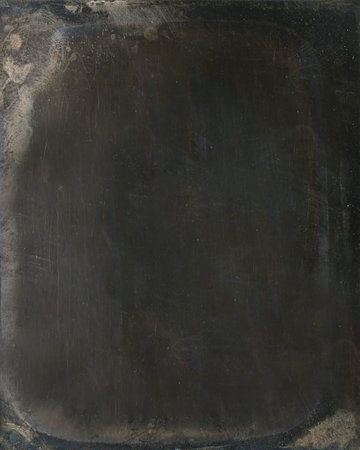 This is a photo texture or overlay created using an actual antique Daguerreotype photograph. It can be used for any photo editing projects.の写真素材