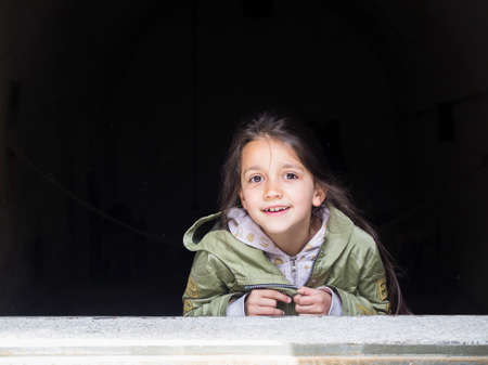 Italy, Bormio, Venini Fort, portrait of a girl inside a fort of the second world war while she is...