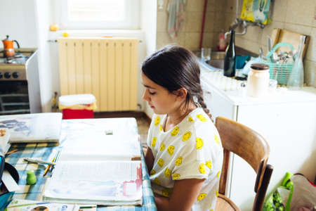Child carries homework