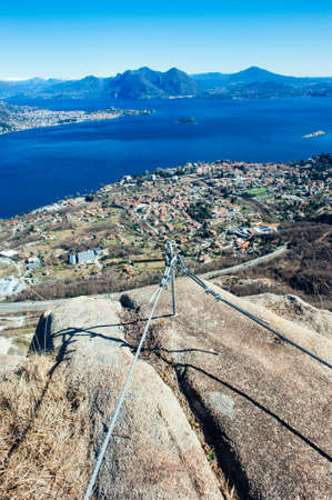 artificial climbing mountain route traced to the mountains of Lake Maggiore, Ferrata called the "Picasass", superb view of Lake Maggioreの写真素材