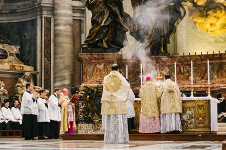 Rome-Italy-10-24-2015. Holy Pontifical Mass in an ancient rite at the Saint Peter's Chair, Mass in Latin, in the Basilica of Saint Peter's in the Vatican, pilgrimage summorum pontificumのeditorial素材