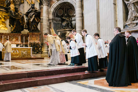 Rome-Italy-10-24-2015. Holy Pontifical Mass in an ancient rite at the Saint Peter's Chair, Mass in Latin, in the Basilica of Saint Peter's in the Vatican, pilgrimage summorum pontificumのeditorial素材