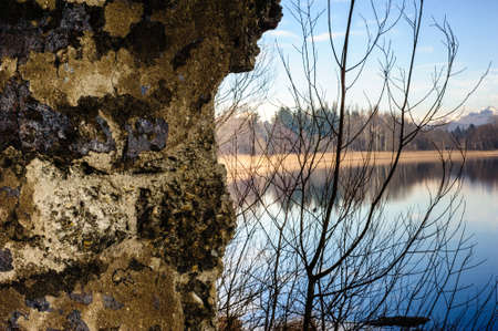 landscape of Lake Varese, through a broken wall,Varese,Lombardy,Italyの写真素材