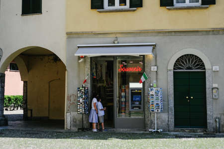 July 31, 2018, Como, Italy, children look inside a souvenirs shop