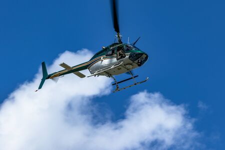 October 12, 2019: Cocoa, Florida / USA - A Brevard County Sheriff's Office helicopter prepares for a landing during the Space Coast Police K9 Competition.のeditorial素材