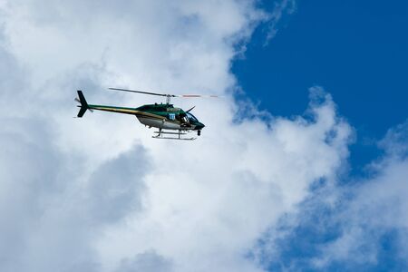 October 12, 2019: Cocoa, Florida / USA - A Brevard County Sheriff's Office helicopter prepares for a landing during the Space Coast Police K9 Competition.のeditorial素材