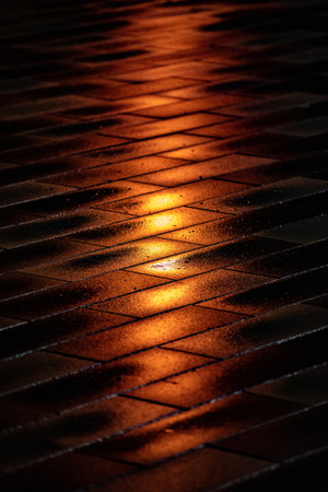 abstract background of a stone pavement in the light of a lanternの写真素材