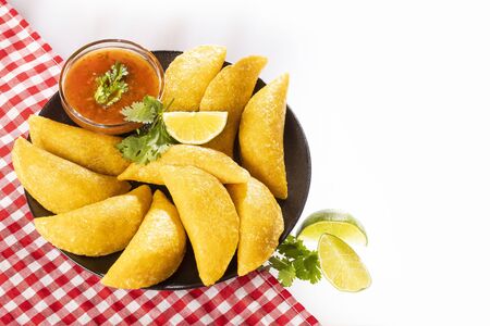 Colombian empanada with spicy sauce. Top viewの写真素材