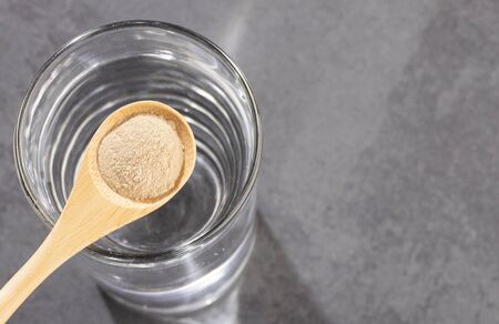 Amla powder and water - Ayurvedic alternative medicine. Phyllanthus emblicaの写真素材