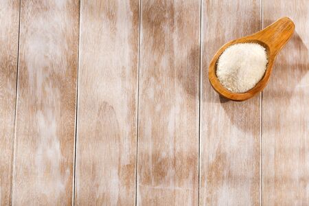 collagen protein powder on wooden spoonの写真素材