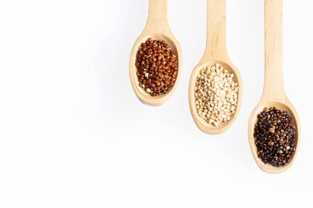 Seeds of white, red and black quinoa - Chenopodium quinoa. White backgroundの写真素材
