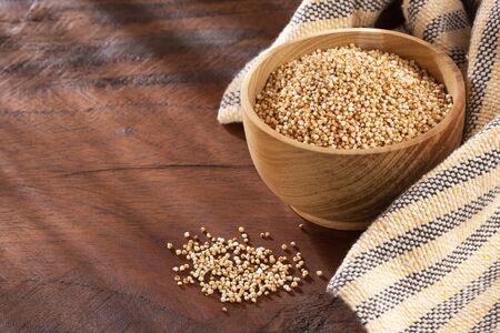 Popped amaranth grain - Amaranthus. Wooden background