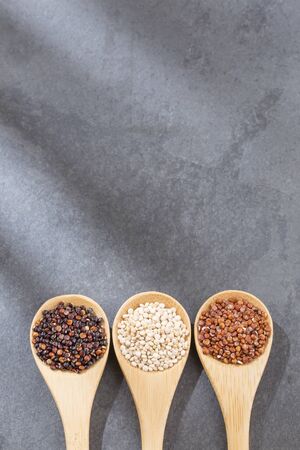 Seeds of white, red and black quinoa - Chenopodium quinoaの写真素材