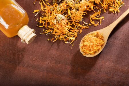 Aromatherapy essential oil with marigold flowers - Calendula officinalisの写真素材
