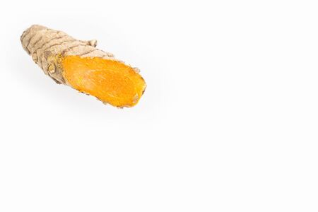 Organic turmeric roots - Curcuma longa. White background
