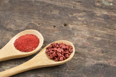 Annatto seeds and powder - Bixa orellanaの写真素材
