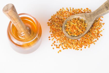 Granulated pollen and honey - Top viewの写真素材