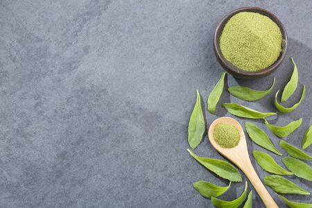 Natural sweetener in powder from stevia plant - Stevia rebaudiana. Top viewの写真素材