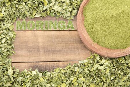 Fresh leaves and moringa powder - Moringa oleifera. Text spaceの写真素材