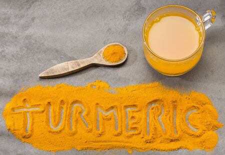 Turmeric and water, healthy drink - Space for text