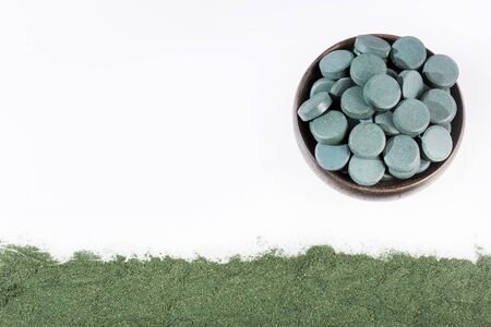 Spirulina algae powder and tablets. Arthrospira platensisの写真素材
