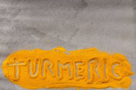 Turmeric powder - Curcuma longa. Space for text