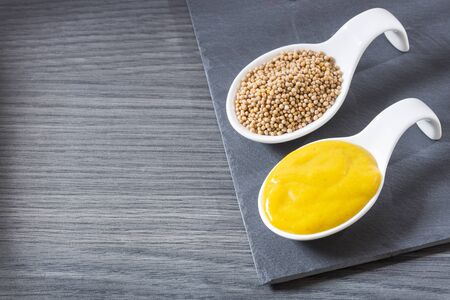 The yellow mustard or also called white mustard, are the whole seeds of Brasica Alba coming from the Mediterranean regionの写真素材