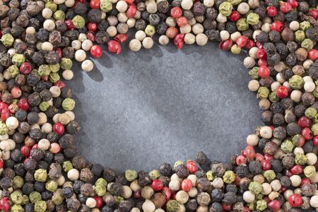 Mixture of colorful peppers - Peppers hot, red, black, white and green pepper.の写真素材