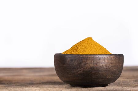 Organic turmeric powder - Curcuma longa. White background