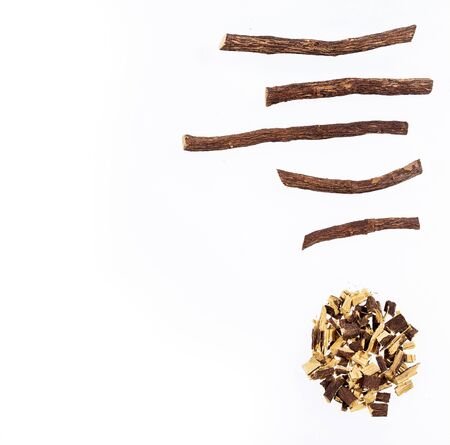 Close up of Ayurvedic herb Liquorice root,Licorice root, Mulethi or Glycyrrhiza glabra root on a wooden surface is very much beneficial for Soothes your stomの写真素材