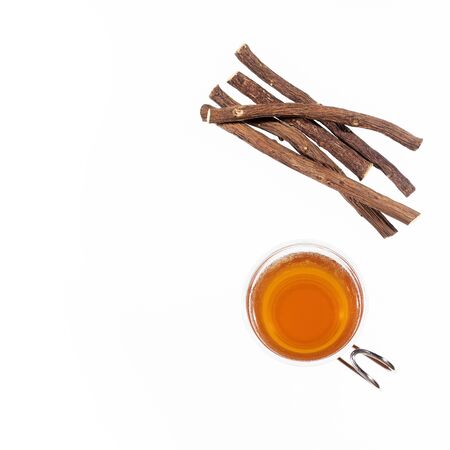 Licorice roots with hot drink - Glycyrrhiza glabraの写真素材