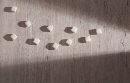White refined sugar powder and cubes - Text space