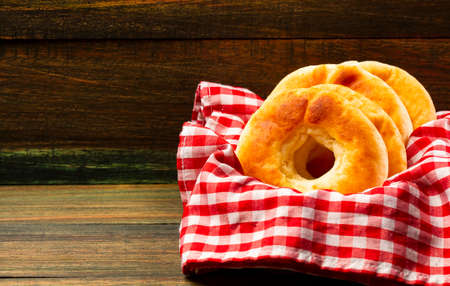 Hot pandequesos on the checkered napkin - Traditional Colombian foodの写真素材