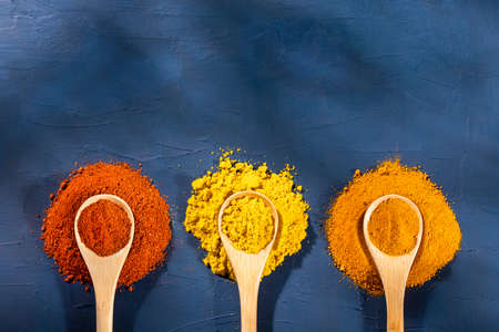 Turmeric, curry and paprika spice set. Text spaceの写真素材