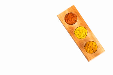 Variety of spices paprika, turmeric and curry - organic powdersの写真素材