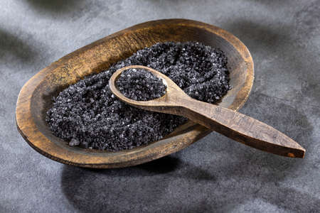 Hawaii natural black salt in spoon and bowlの写真素材
