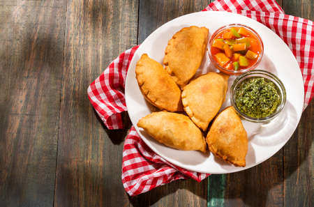 Traditional baked Argentinian empanadas savory pastries with meat beef stuffingの写真素材