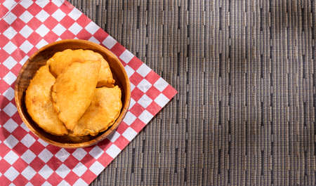 Traditional baked Argentinian empanadas savory pastries with meat beef stuffingの写真素材