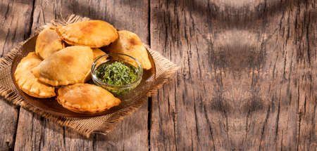 Traditional baked Argentinian empanadas savory pastries with meat beef stuffingの写真素材