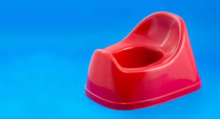 Red plastic potty for children - Text spaceの写真素材