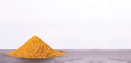 Organic brown sugar pile - Saccharum officinarumの写真素材