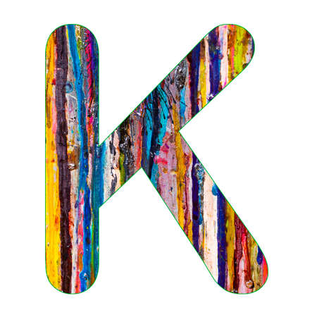 Alphabet letter K on dripping paint backgroundの写真素材