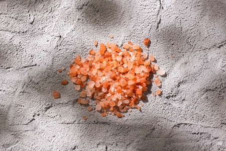 Himalayan pink salt crystals, powdered red rock salt from Pakistanの写真素材